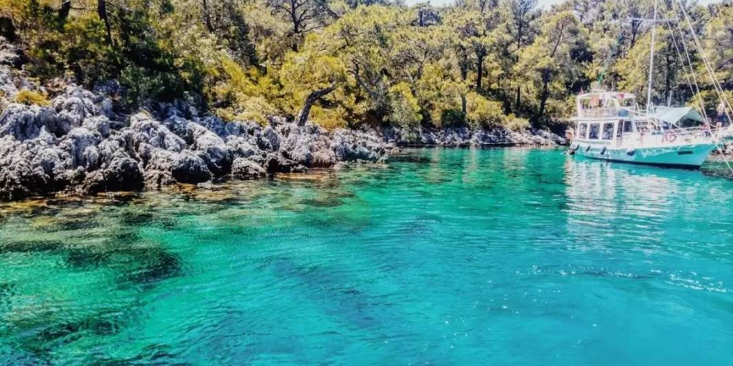 Cam gibi deniz, altın kum! Burası tam ailelere göre: Cennet koy sizi kucaklamayı bekliyor 9